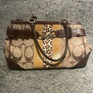 Coach Brown and tan great condition signature carryall with matching wristlet.